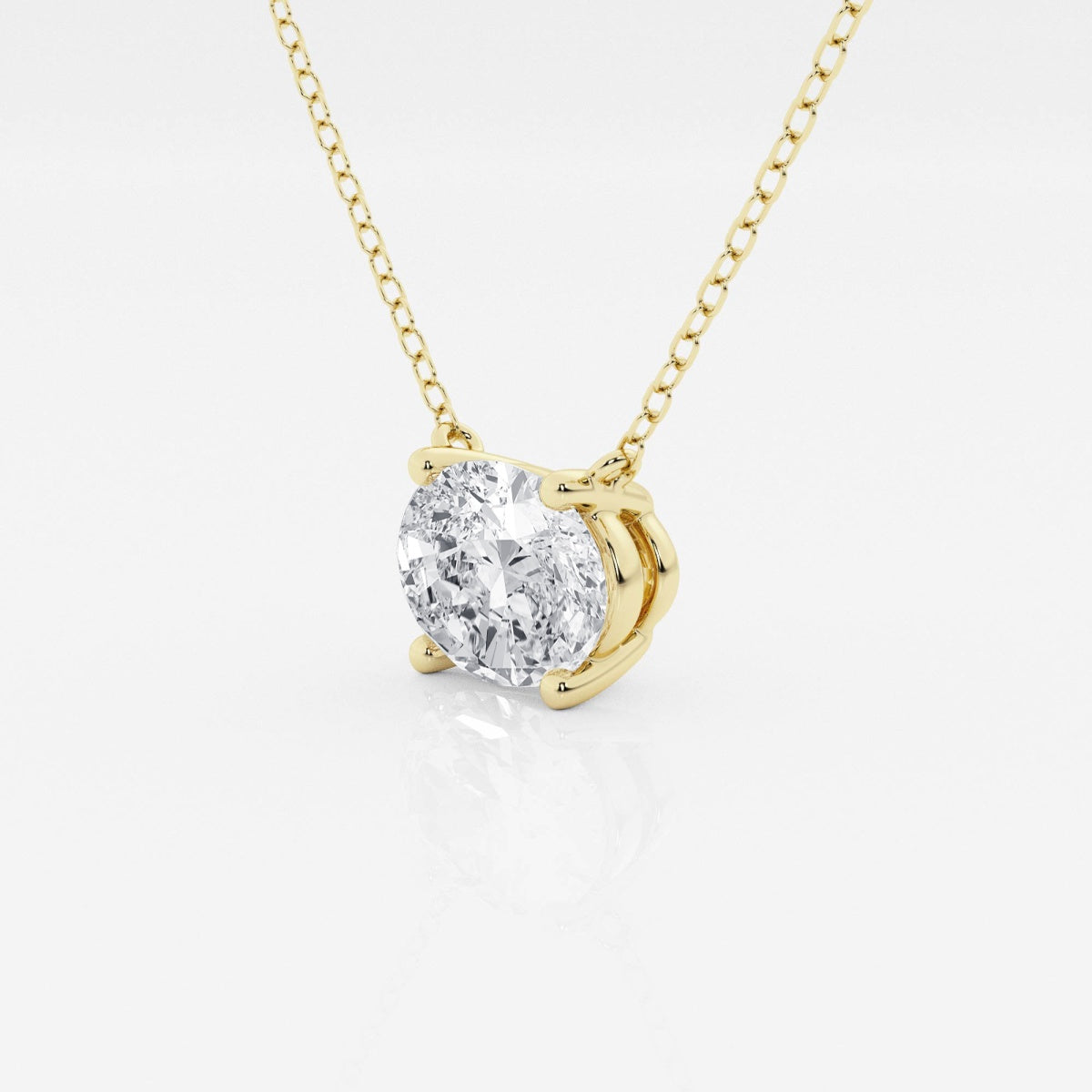 Oval Diamond Solitaire Pendant In White or Yellow Gold