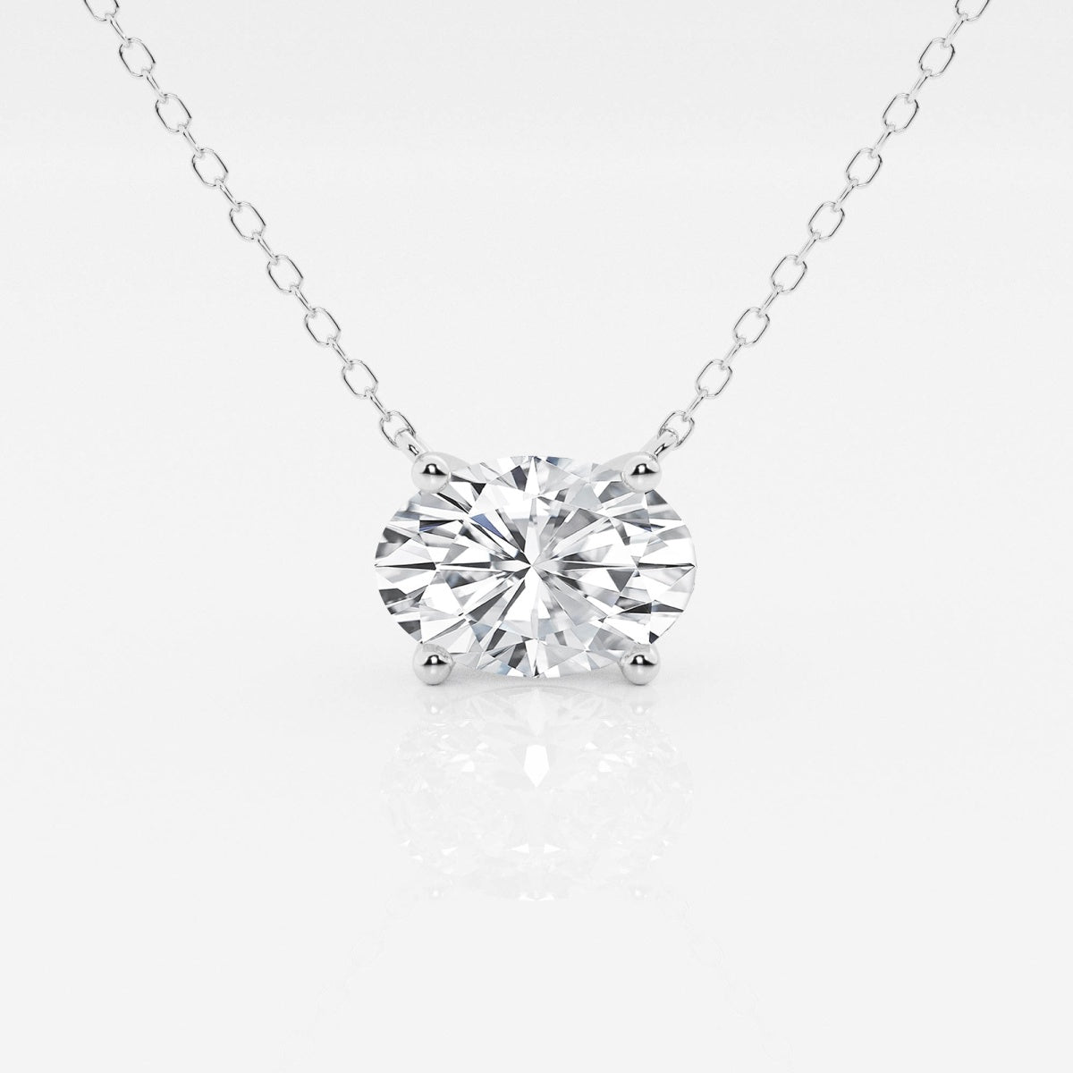 Oval Diamond Solitaire Pendant In White or Yellow Gold