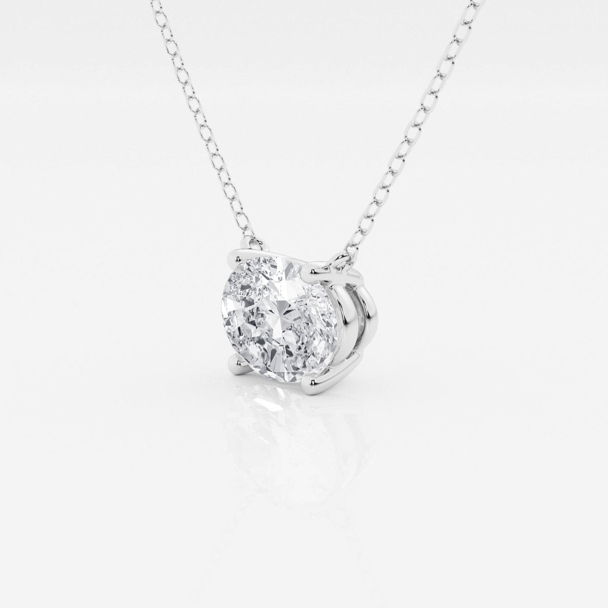 Oval Diamond Solitaire Pendant In White or Yellow Gold